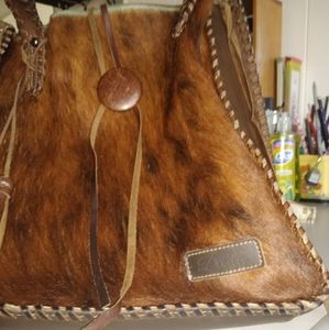 Delila genuine leather and furr purse